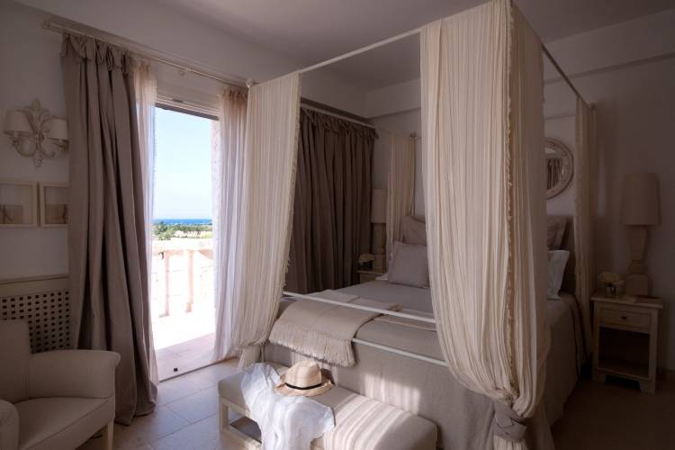 Дизайн спальни в отеле Borgo Egnazia