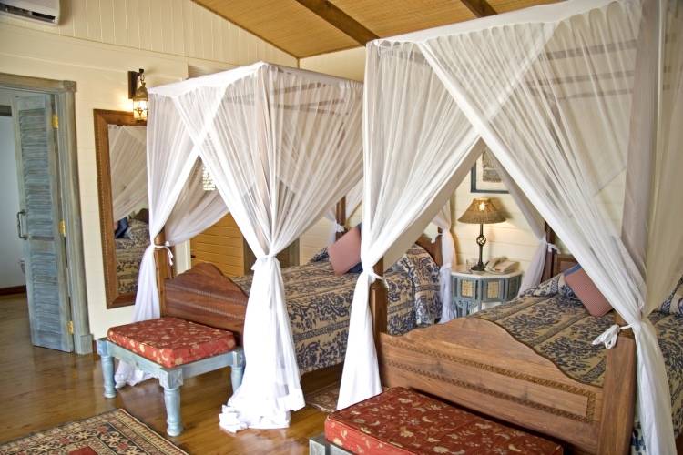 Дизайн спальни в отеле Anantara Medjumbe Island Resort & Spa