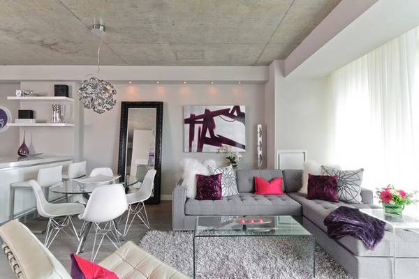 Серый цвет стен в интерьере квартиры в стиле лофт