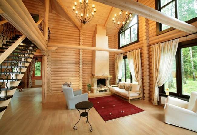 Внутренний дизайн деревянного загородного дома из бревен 