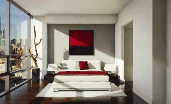 белый ковёр на тёмном полу в интерьере современной спальни